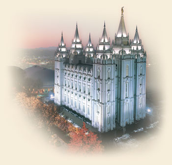 The Salt Lake Temple lit up at dusk