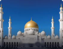 Mosque with a golden dome and minarets